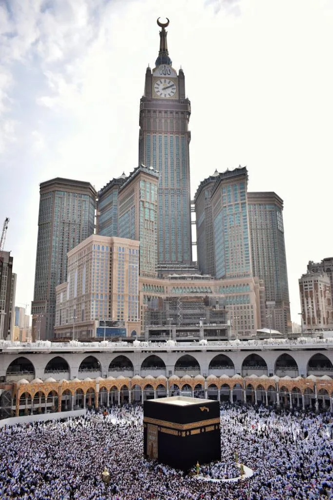 Stunning view of Abraj Al Bait towering over the Kaaba and Masjid Al Haram in Mecca.