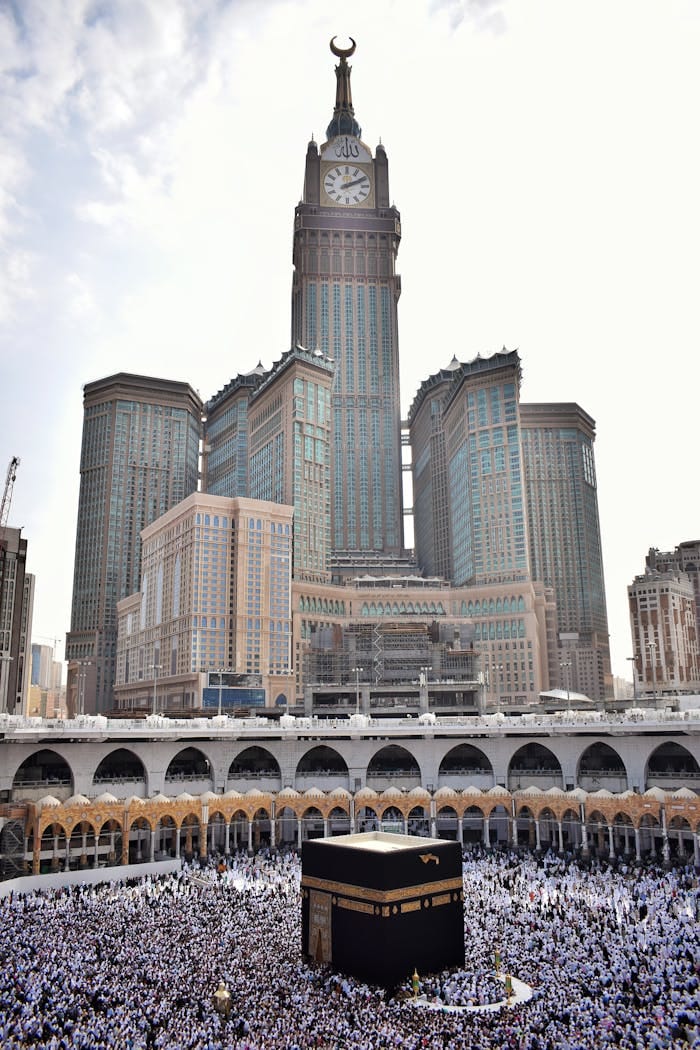 Stunning view of Abraj Al Bait towering over the Kaaba and Masjid Al Haram in Mecca.